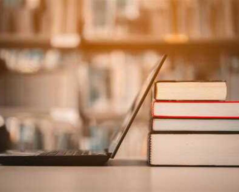 Books and a computer 