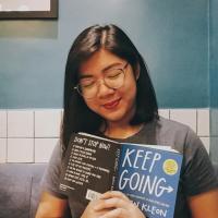 Isabelle Villaruel, holding a book.