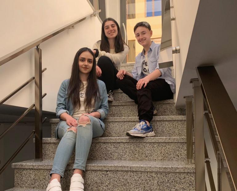 A team photo on stairs