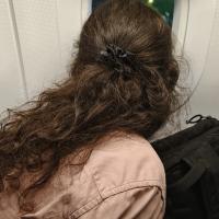 A picture of me, looking through a plane’s window.