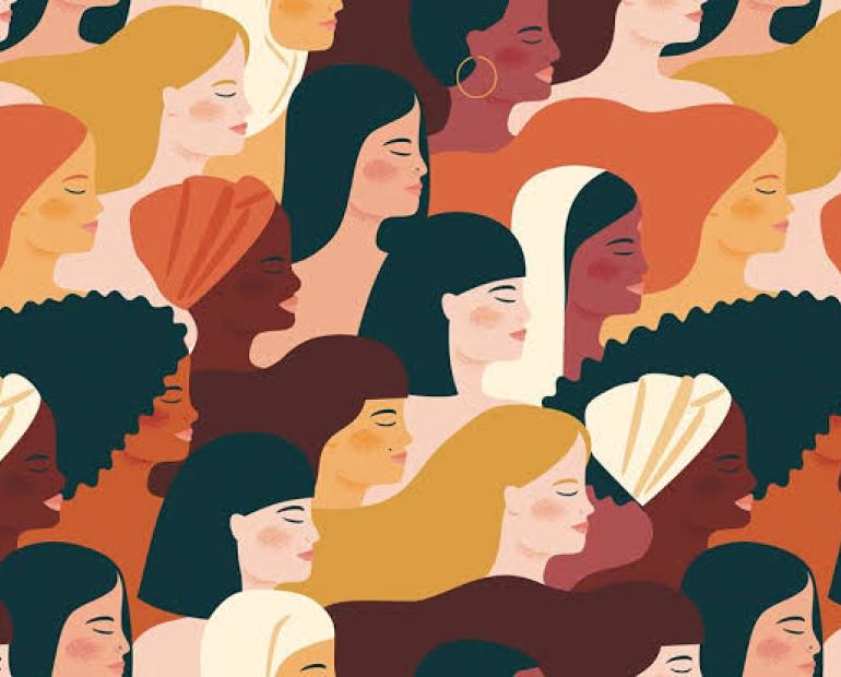Graphic showing women with different colours; stating unity.