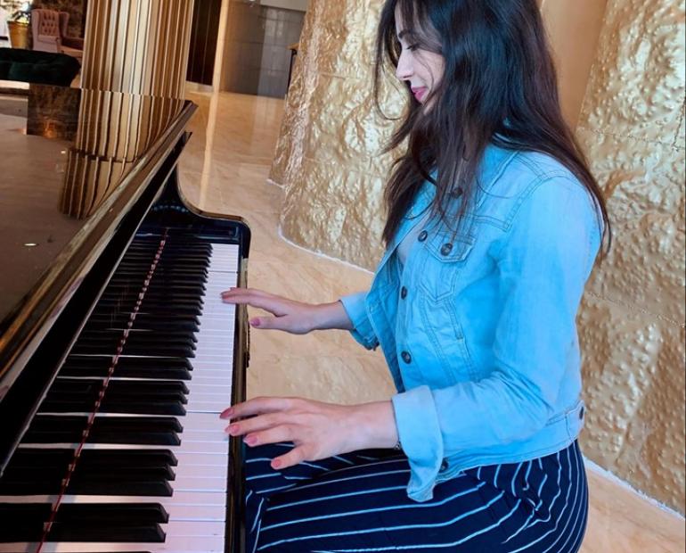 Youth playing the piano