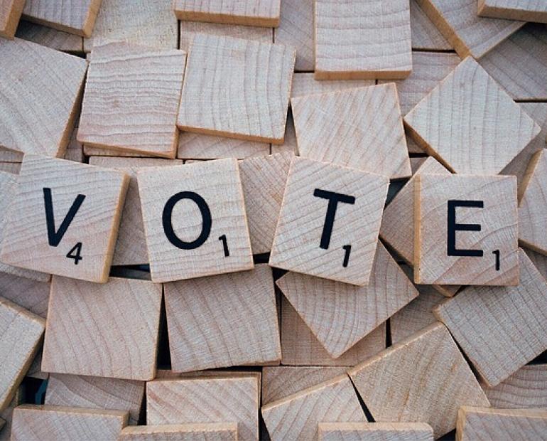 The word vote written using block letters