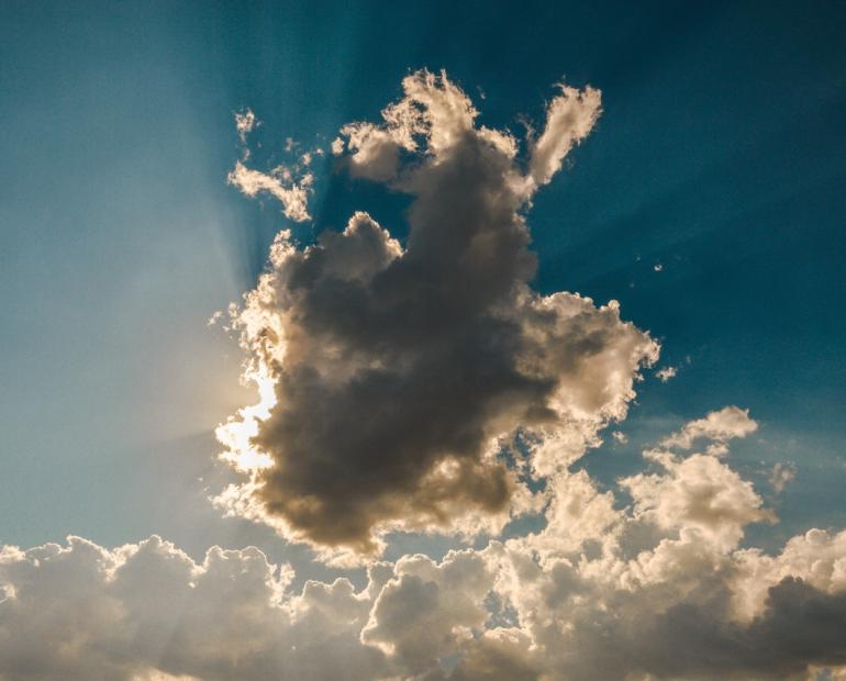 The sun hidden behind some clouds