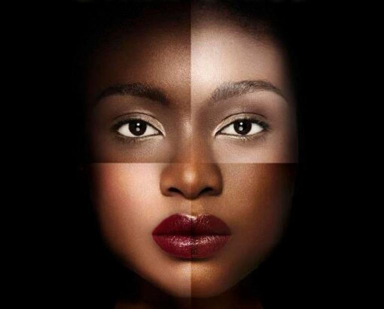 A woman with four different skin tones.