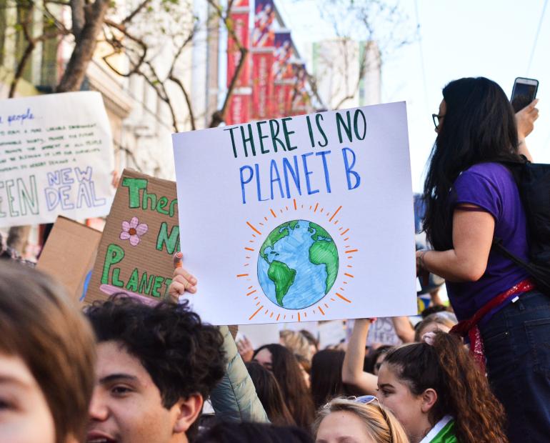 A placard reads "There is no planet B" at a youth protest.