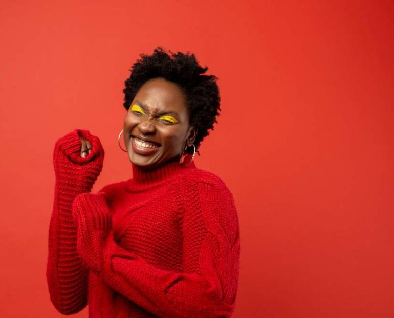 Smiley woman in red sweater