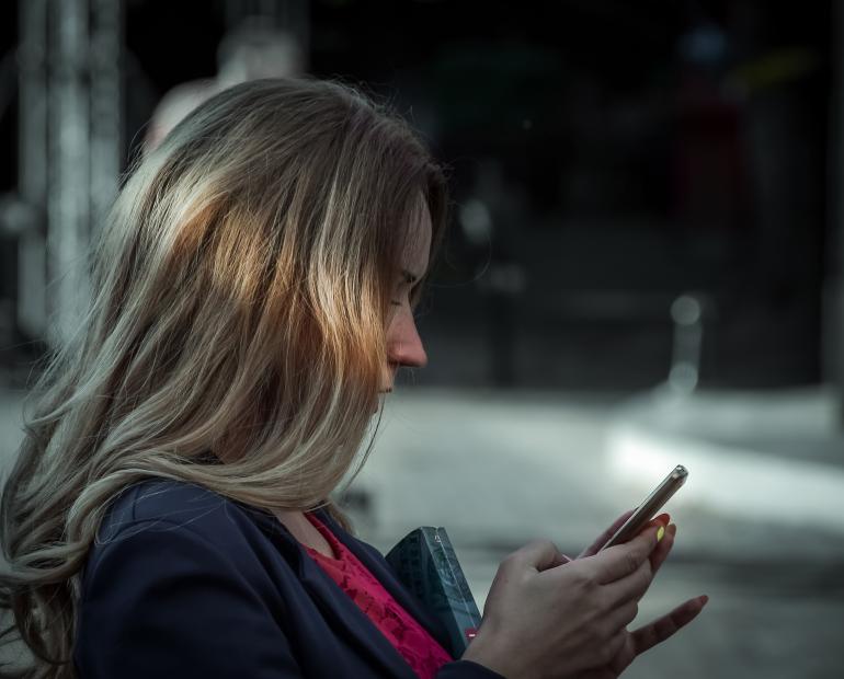 Girl typing on phone