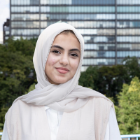 A photo of Areej smiling.